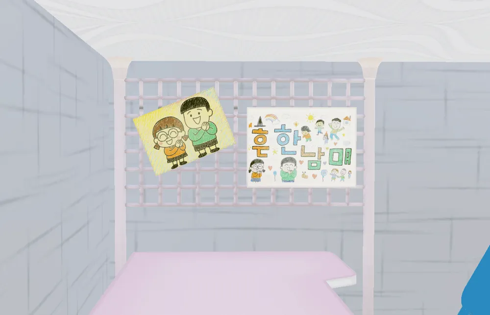 Character illustrations and the logo displayed above Amy’s desk